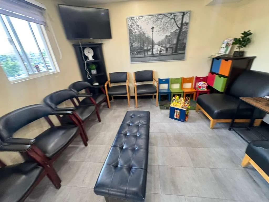 Comfortable walk-in urgent care waiting room with seating area in San Diego County